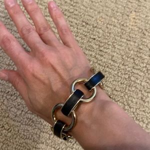 Cute JCrew fashion gold ring with black leather accent bracelet.